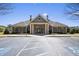 Exterior of a clubhouse, showcasing architectural details and a welcoming entrance at 2740 Heritage Bend Sw Ct, Grayson, GA 30017