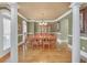 Elegant dining room showcasing hardwood floors, wainscoting, and natural light at 2740 Heritage Bend Sw Ct, Grayson, GA 30017