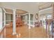 Spacious dining area with hardwood floors, wainscoting, and elegant chandelier at 2740 Heritage Bend Sw Ct, Grayson, GA 30017