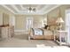 Comfortable main bedroom with a four-poster bed, natural light, and plush carpeting at 2740 Heritage Bend Sw Ct, Grayson, GA 30017