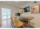 Home bar area that leads to an outdoor pool at 124 White Oak Trl, Cumming, GA 30028
