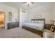 This bedroom has carpet, a ceiling fan, and LED accent lights at 124 White Oak Trl, Cumming, GA 30028
