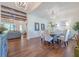 Open floor plan with view of dining room and living room featuring hardwood floors at 124 White Oak Trl, Cumming, GA 30028