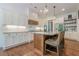 Gourmet kitchen featuring stainless appliances, tiled backsplash, and pendant lighting at 124 White Oak Trl, Cumming, GA 30028