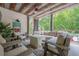 Gorgeous patio area with comfortable seating that overlooks a pool at 124 White Oak Trl, Cumming, GA 30028