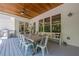 This porch is large and features a beautiful wood ceiling at 124 White Oak Trl, Cumming, GA 30028