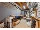 Unfinished basement with exposed pipes and block wall, ready for customization at 1679 Summit Place Way, Loganville, GA 30052