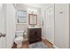 Updated bathroom features a vanity, toilet, and shower with new fixtures at 1679 Summit Place Way, Loganville, GA 30052