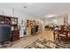 This home office offers multiple work spaces, including two desks, file cabinets, and shelving units at 1679 Summit Place Way, Loganville, GA 30052