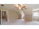 The bonus room has angled ceilings, neutral walls, and multiple doors and windows at 3510 Eagle Landing Dr, Snellville, GA 30039