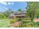 Charming brick home with a covered front porch and lush landscaping at 3510 Eagle Landing Dr, Snellville, GA 30039