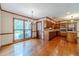 Charming eat-in kitchen features wooden cabinets, stainless steel appliances, and hardwood floors at 3510 Eagle Landing Dr, Snellville, GA 30039
