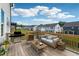 Enjoy outdoor living on this spacious deck with a grill and comfortable seating area with neighborhood views at 784 Keystone Dr, Woodstock, GA 30188