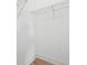 Walk-in closet with hardwood floors and metal shelving for efficient storage at 784 Keystone Dr, Woodstock, GA 30188