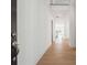 Bright and airy foyer with hardwood floors, high ceilings, and a view of the staircase and living area at 784 Keystone Dr, Woodstock, GA 30188