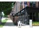 Charming storefront featuring large windows, brick columns, and black awnings, creating an inviting atmosphere at 784 Keystone Dr, Woodstock, GA 30188