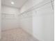 Empty walk-in closet with ample shelving to maximize storage at 784 Keystone Dr, Woodstock, GA 30188
