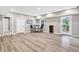 Finished basement showcasing durable flooring, neutral paint, and direct access to the outdoors at 1231 Ellington Ct, Cumming, GA 30041