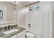 Bathroom with white shower and vanity with stone countertop at 1231 Ellington Ct, Cumming, GA 30041