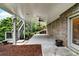 Concrete backyard patio with stairs, and green space at 1231 Ellington Ct, Cumming, GA 30041
