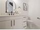Stylish half bathroom with white vanity and marble countertops at 1273 Grayson Pkwy, Grayson, GA 30017