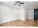 Spacious bedroom with hardwood floors, ceiling fan, and modern trim at 1273 Grayson Pkwy, Grayson, GA 30017