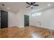 Inviting bedroom showcasing hardwood floors, trim, and modern ceiling fan at 1273 Grayson Pkwy, Grayson, GA 30017