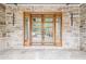 Elegant front entrance with a double door and detailed stonework at 1273 Grayson Pkwy, Grayson, GA 30017
