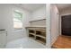Pantry with custom shelving, storage space, countertop, and window at 1273 Grayson Pkwy, Grayson, GA 30017
