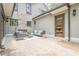 Inviting outdoor patio with a stone fireplace, comfortable seating, and stylish decor at 1273 Grayson Pkwy, Grayson, GA 30017
