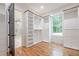 Expansive walk-in closet with custom shelving and storage solutions at 1273 Grayson Pkwy, Grayson, GA 30017