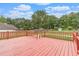 Spacious red wooden deck overlooking a large green yard at 1419 Gates Mill Walk, Lawrenceville, GA 30045