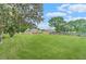 Expansive green backyard with ample space for outdoor activities and relaxation at 1419 Gates Mill Walk, Lawrenceville, GA 30045