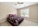 Bright bedroom featuring a large window and carpeted floors at 1419 Gates Mill Walk, Lawrenceville, GA 30045