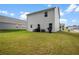 Backyard featuring a grassy lawn at 217 Limestone Cir, Conyers, GA 30013