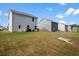 Large grassy backyard showcasing the property's spacious outdoor area and potential for various activities at 217 Limestone Cir, Conyers, GA 30013