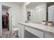 Bathroom with granite countertop vanity and a closet in the background at 217 Limestone Cir, Conyers, GA 30013