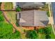 Aerial view showcasing the home's layout and landscaped yard at 2275 Black Pebble Cir, Buford, GA 30519