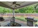 Spacious backyard featuring a well-maintained lawn and an outdoor seating area at 2275 Black Pebble Cir, Buford, GA 30519