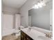 Bright bathroom offering a double sink vanity, tile floors, a large mirror, and a tub/shower combo at 2275 Black Pebble Cir, Buford, GA 30519