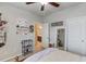 Cozy bedroom offering a ceiling fan, a closet, and access to the en-suite bathroom at 2275 Black Pebble Cir, Buford, GA 30519
