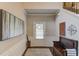 Spacious foyer with hardwood floors, staircase, bench, and natural light at 2275 Black Pebble Cir, Buford, GA 30519