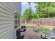 Outdoor patio area with comfortable seating, perfect for entertaining guests at 2275 Black Pebble Cir, Buford, GA 30519