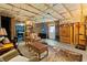 A finished basement featuring exposed ceiling and wood planking at 3420 Griffin Way, Cumming, GA 30040