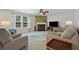 Comfortable living room with a fireplace and abundant natural light at 3420 Griffin Way, Cumming, GA 30040