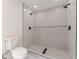 Modern bathroom showcasing a stylish tile shower with sleek, black fixtures at 525 Rosemont Dr, Decatur, GA 30032