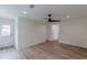 Spacious bedroom boasts hardwood floors, neutral walls, and a doorway at 525 Rosemont Dr, Decatur, GA 30032