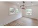 Bright dining room featuring new floors and lots of natural light from the large windows at 525 Rosemont Dr, Decatur, GA 30032