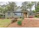 Charming single-story home with an inviting entrance and manicured landscaping at 525 Rosemont Dr, Decatur, GA 30032