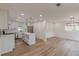 Bright kitchen features white cabinets, stainless steel appliances, and a central island at 525 Rosemont Dr, Decatur, GA 30032